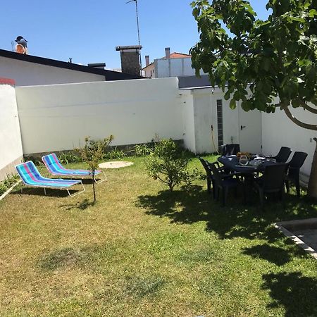 Arvore Cozy Com Jardim Buitenkant foto